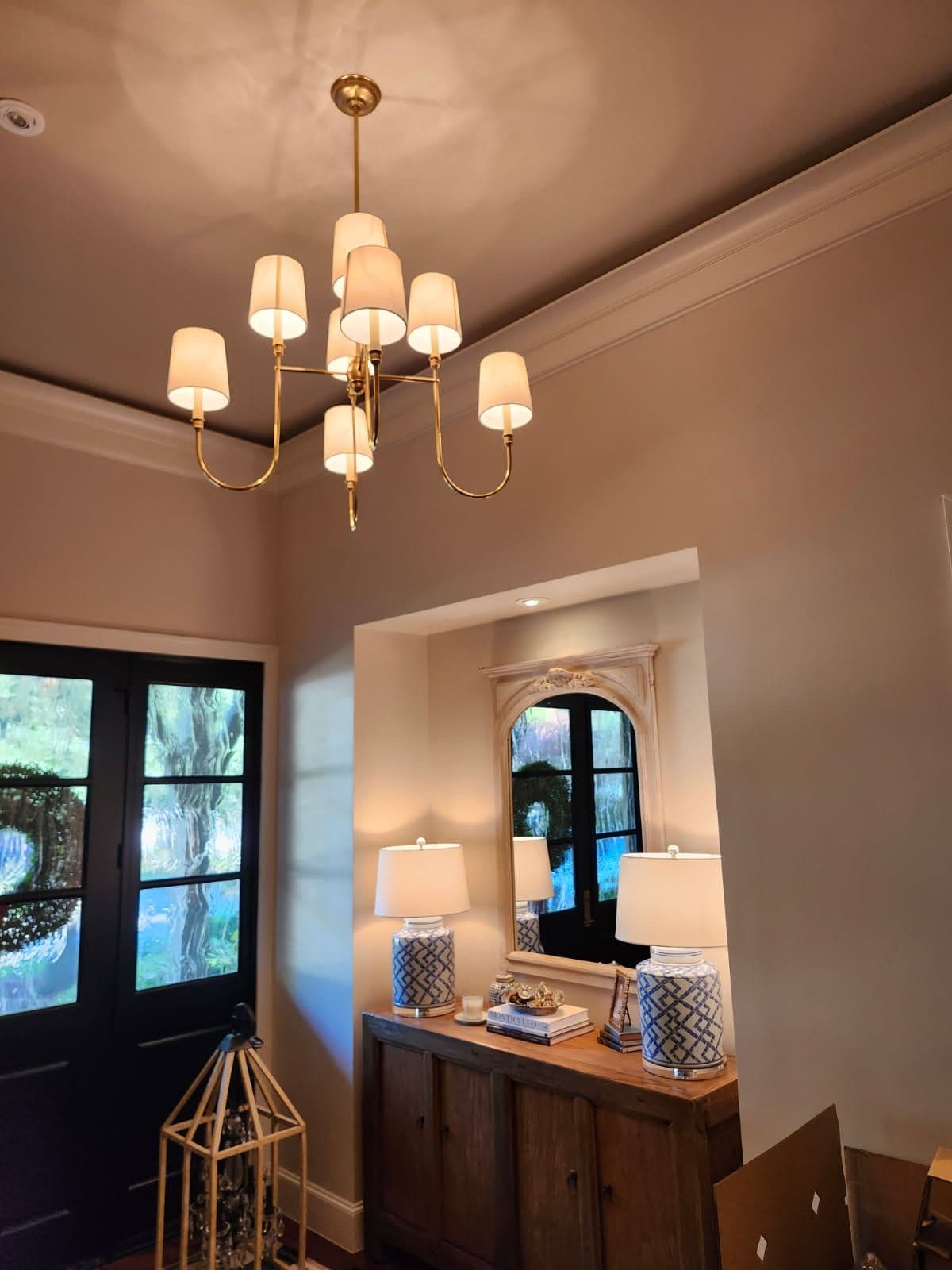 Elegant Chandelier Installation Enhances Living Space image